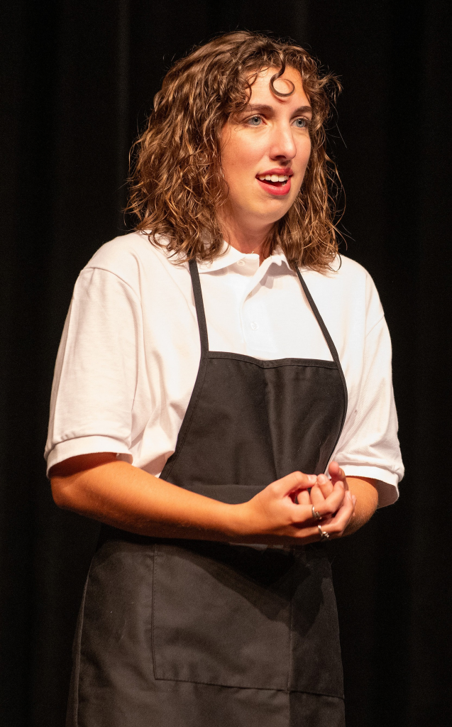 first you smile woman on stage